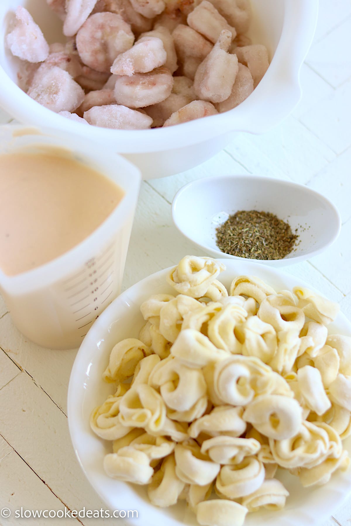Ingredients needed for making crock pot shrimp alfredo tortellini