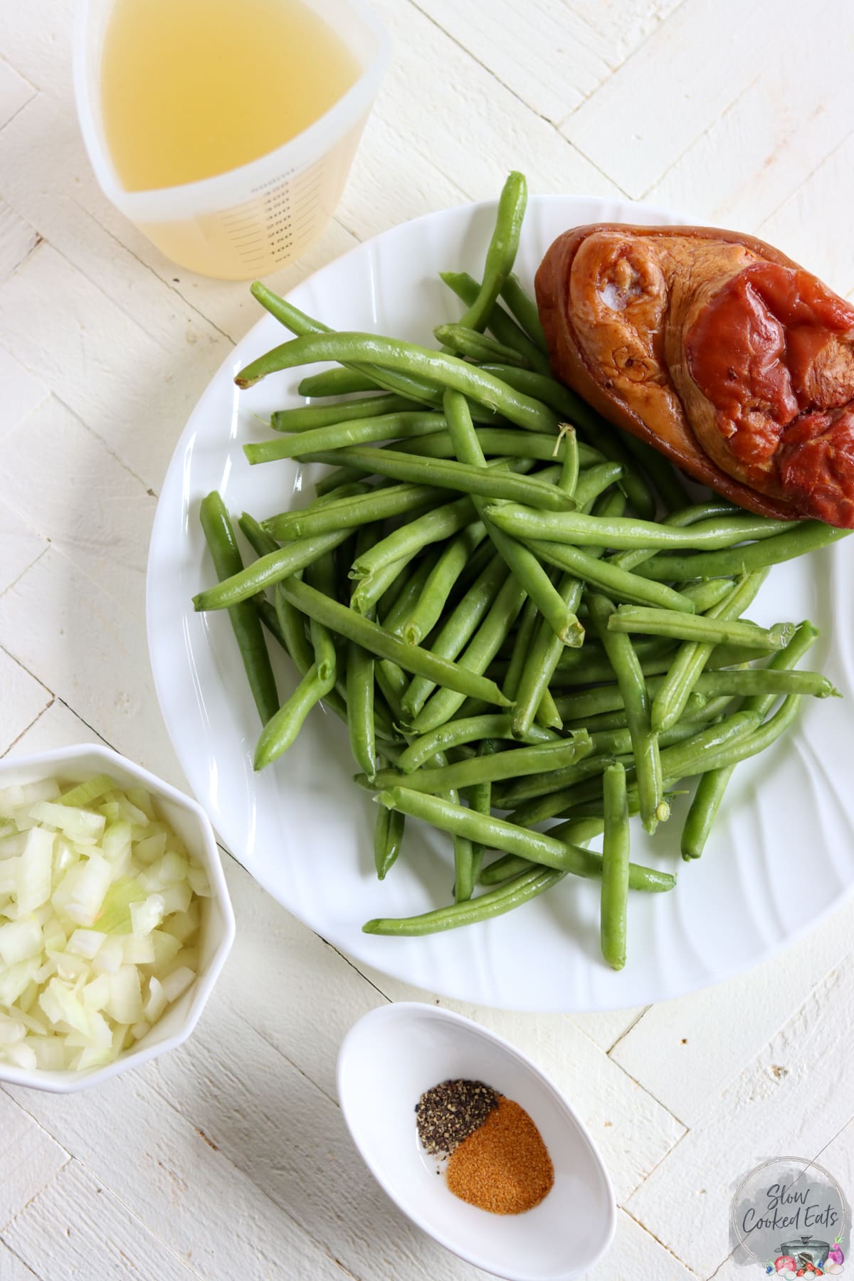Ingredients needed for making ham and green beans in crock pot.