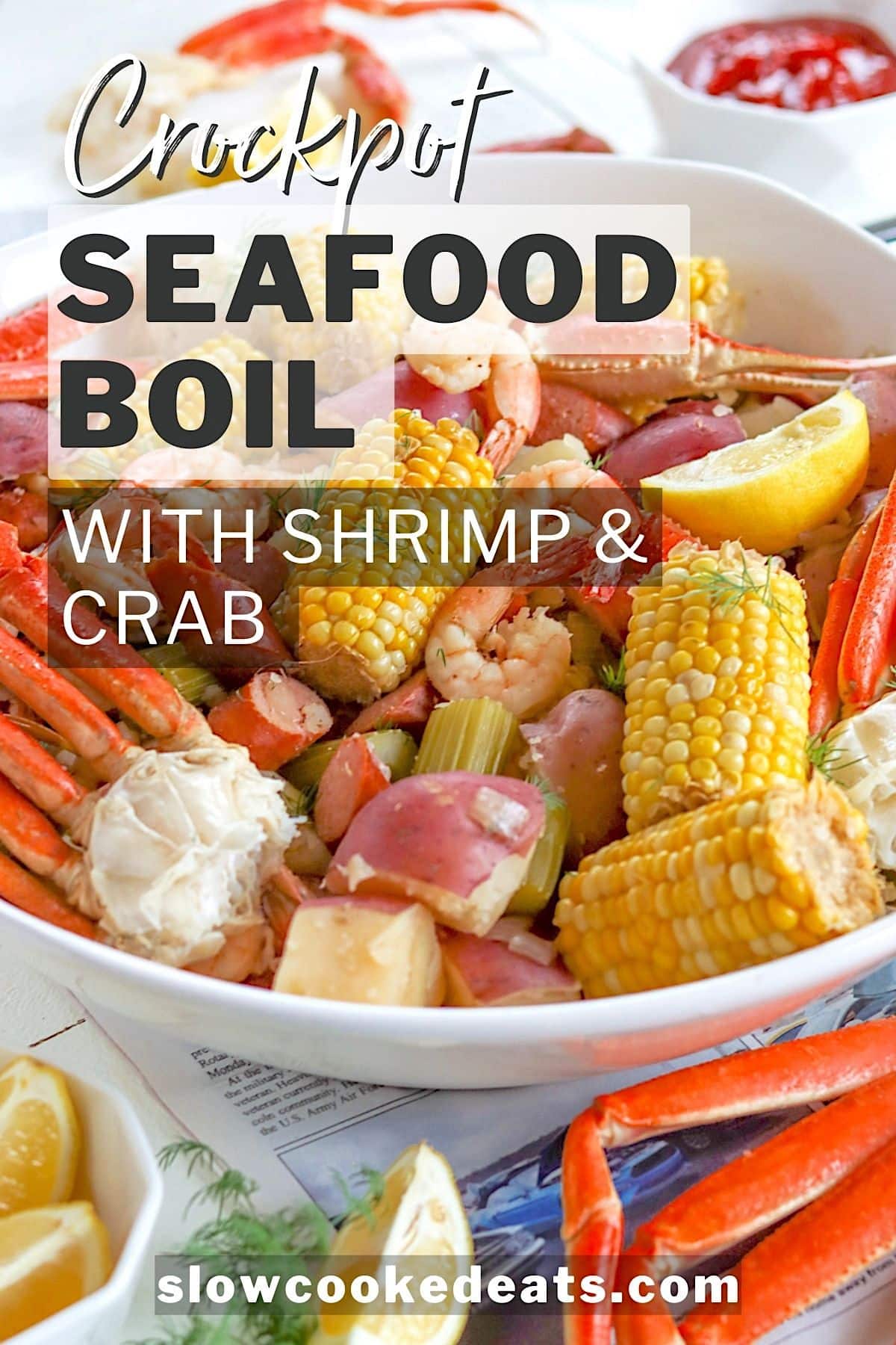 Pinterest pin with crock pot seafood boil served in a large white platter.