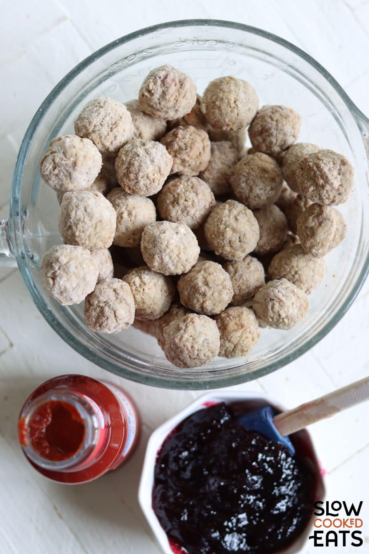 Ingredients needed to make grape jelly chili sauce meatballs crockpot recipe.