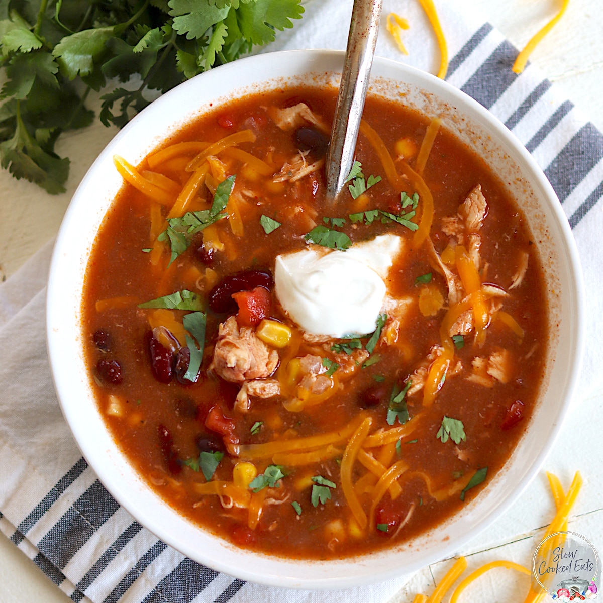 A white bowl of chicken taco soup.