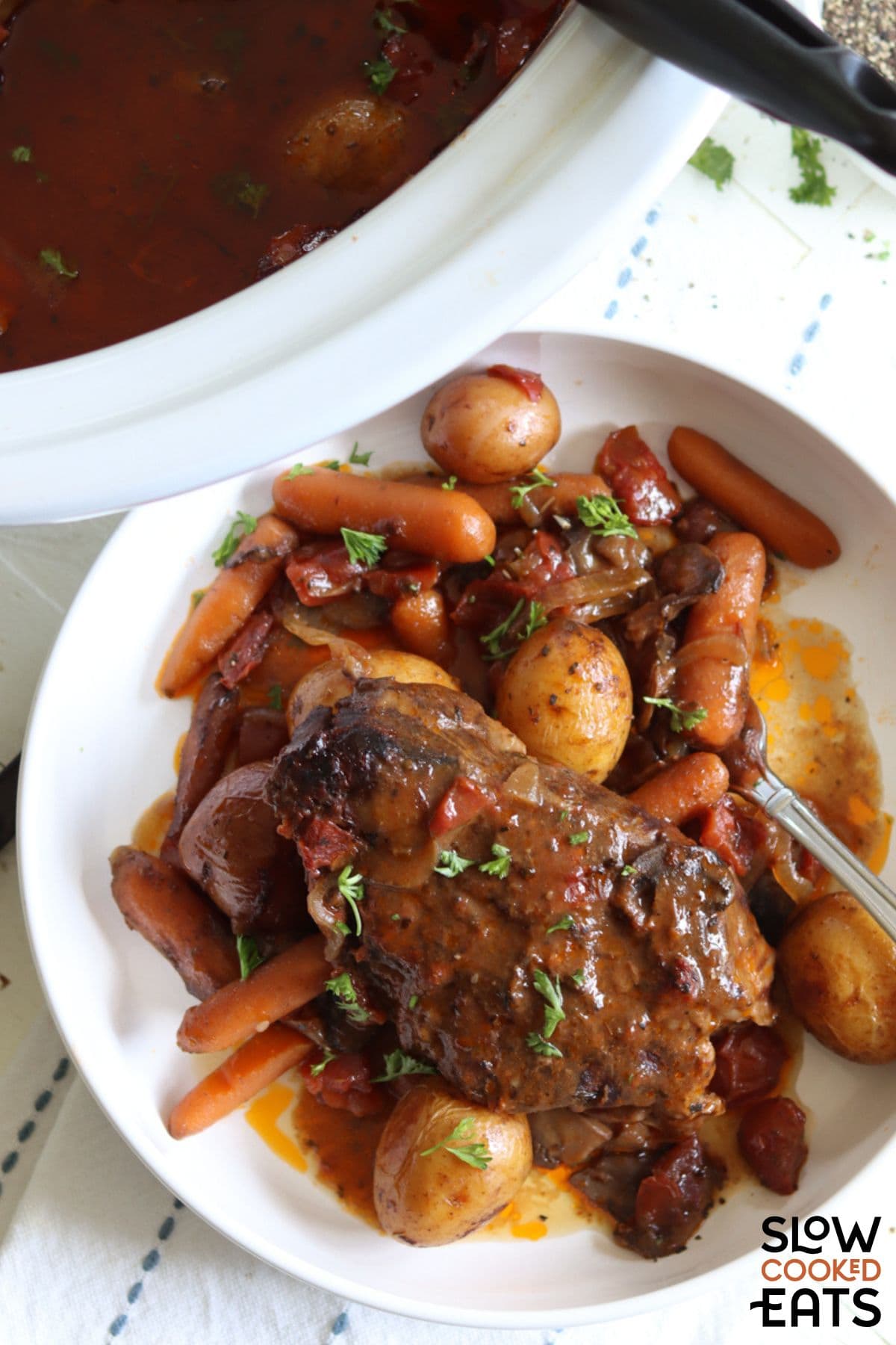 Chuck roast and potatoes in crock pot.