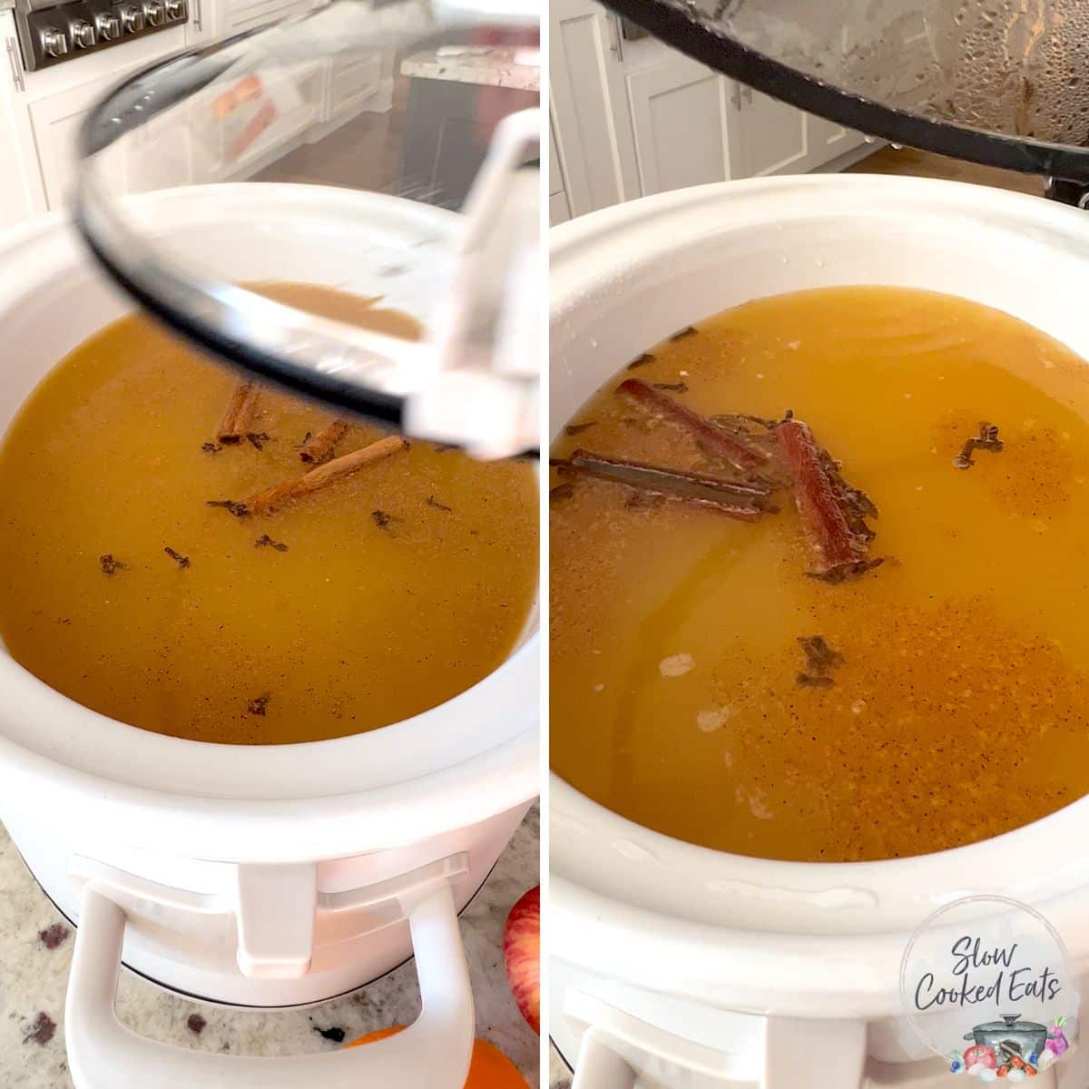 Slow cooker apple cider with spices and orange juice slow cooking in a white pot.