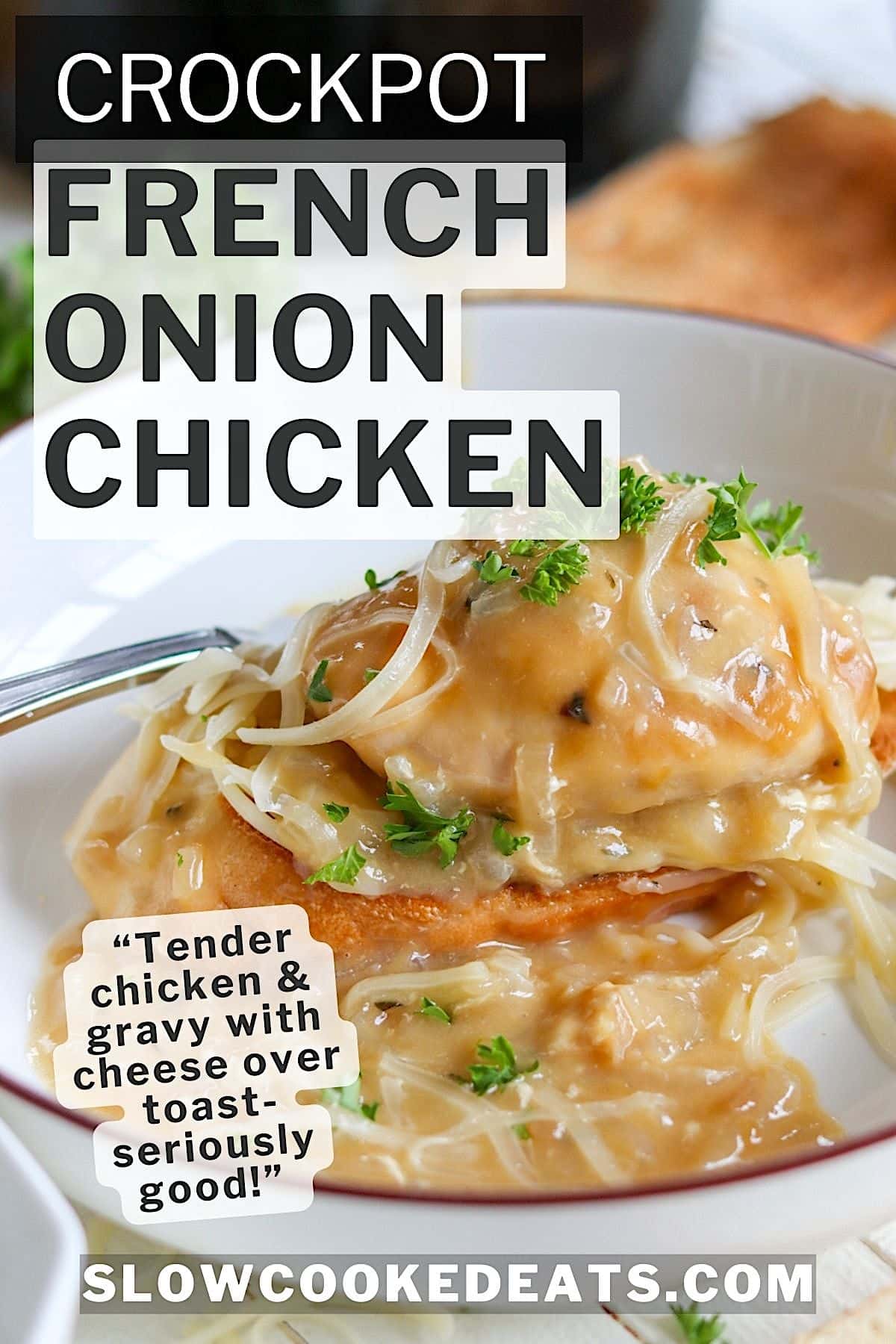 Creamy French onion chicken crock pot recipe served over toasted breast with shredded cheese and fresh parsley in a white bowl.