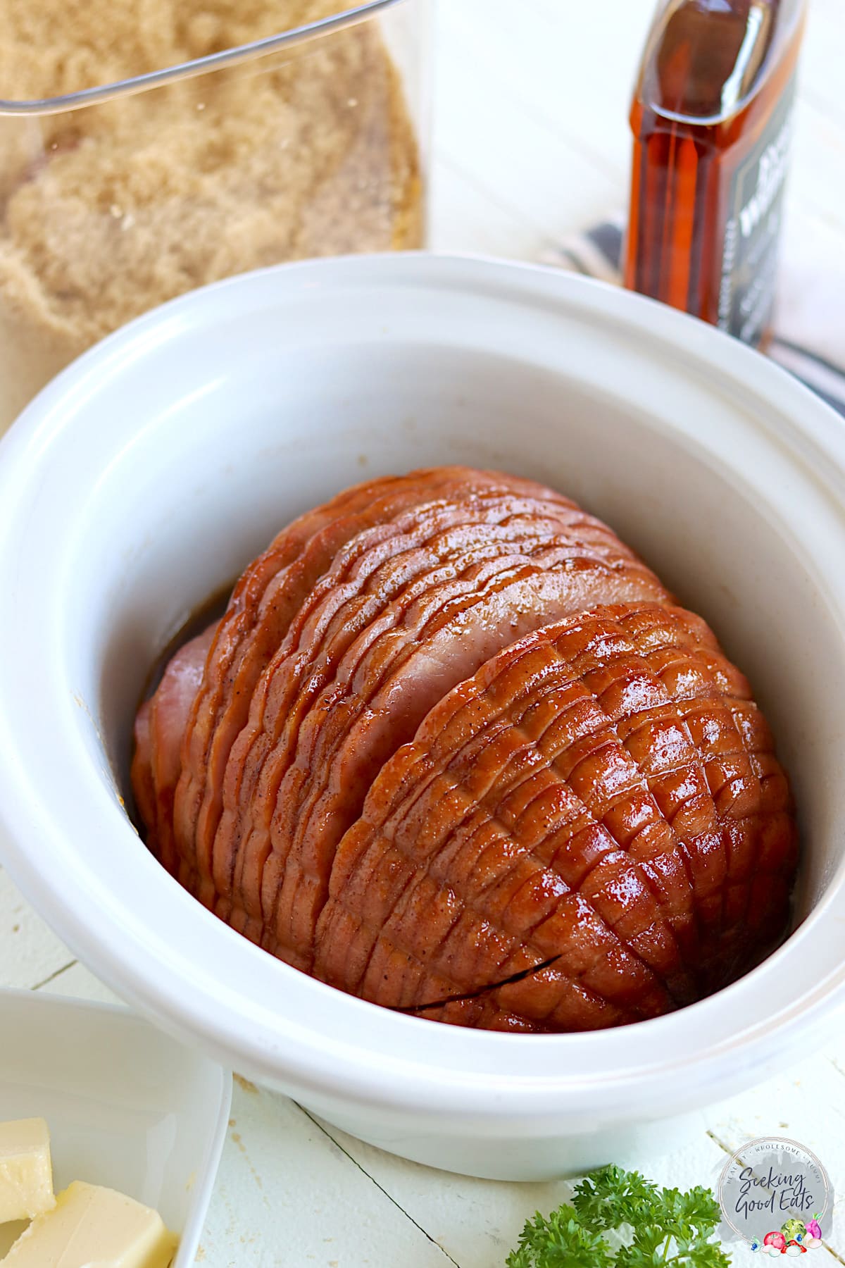 A spiral sliced ham with coke in slow cooker.