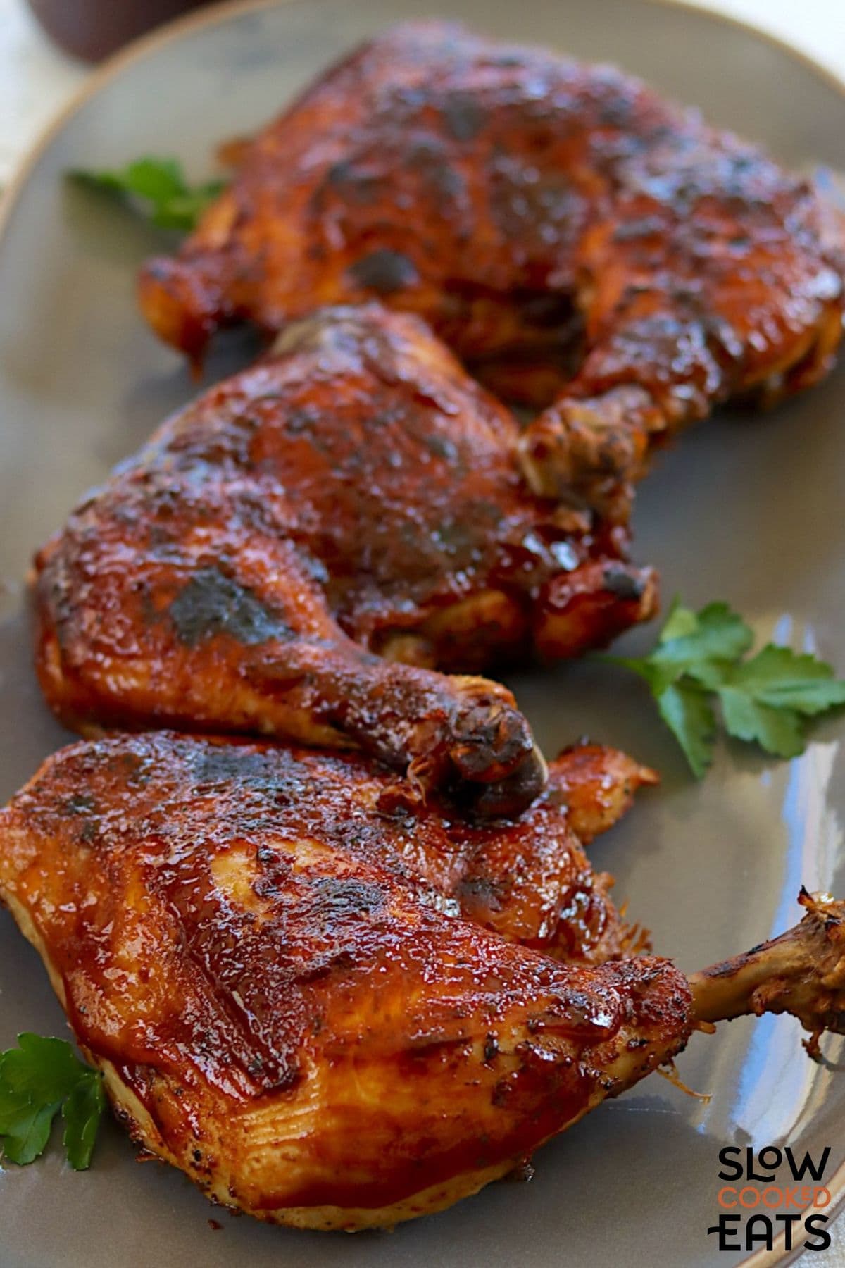 Close-up view of the BBQ chicken leg quarters.