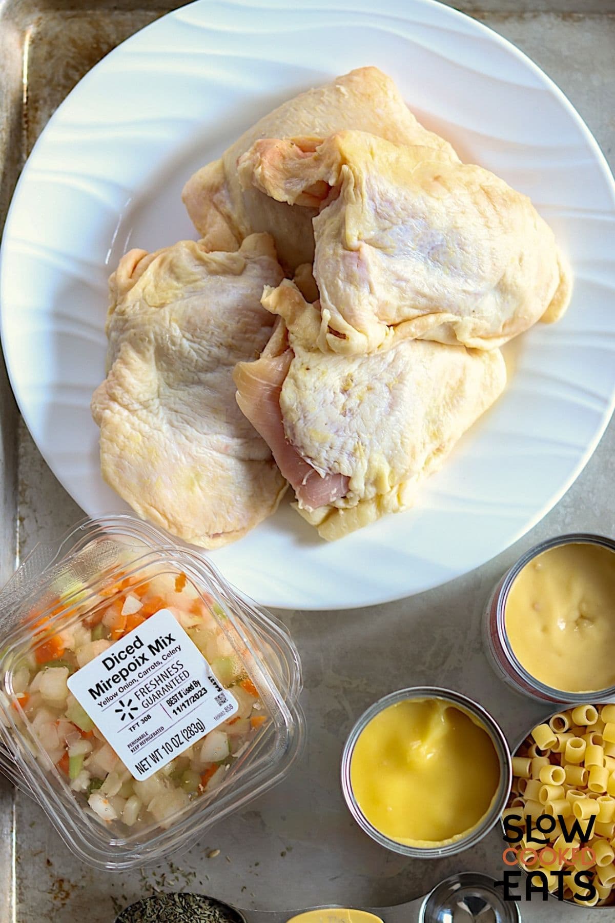 Image of ingredients needed for the 5 ingredient crockpot chicken noodle soup recipe.
