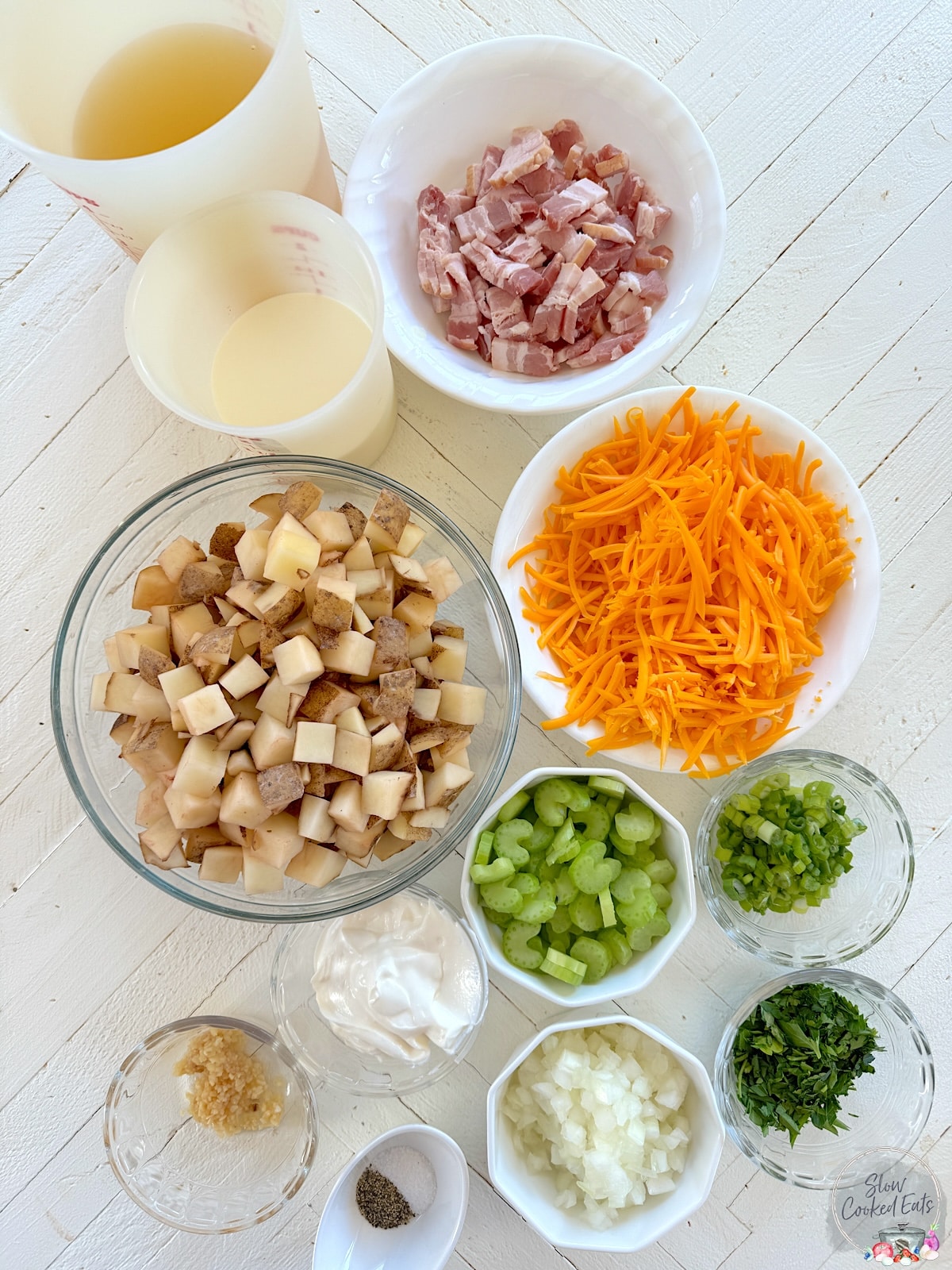 Ingredients for making loaded potato soup in crockpot.
