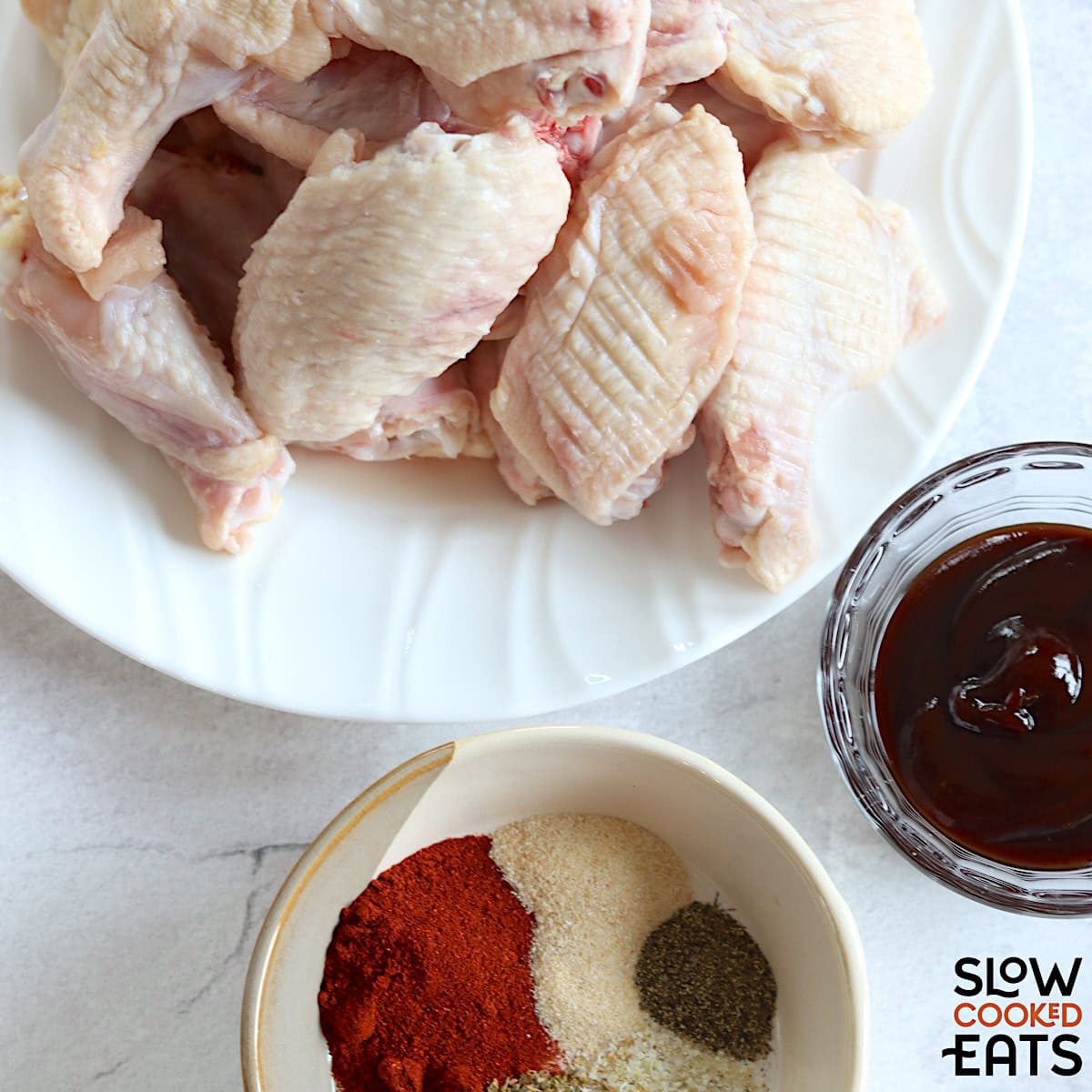 Ingredients needed for making BBQ chicken wings crockpot recipe.