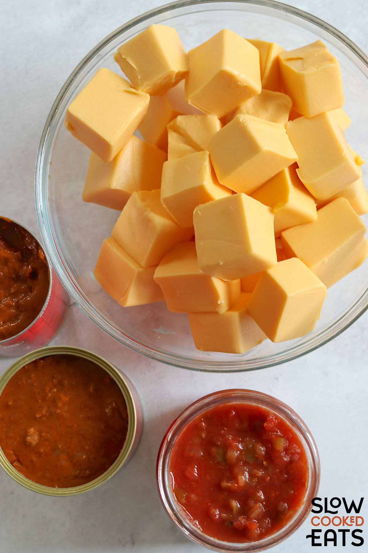Hormel chili cheese dip ingredients on a white board.