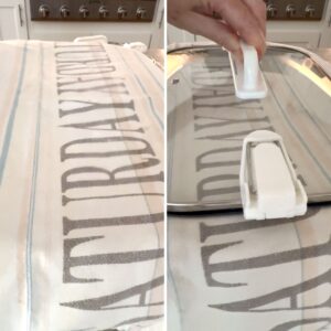 Pumpkin crockpot dump cake covered in a clean towel and the lid while slow cooking.