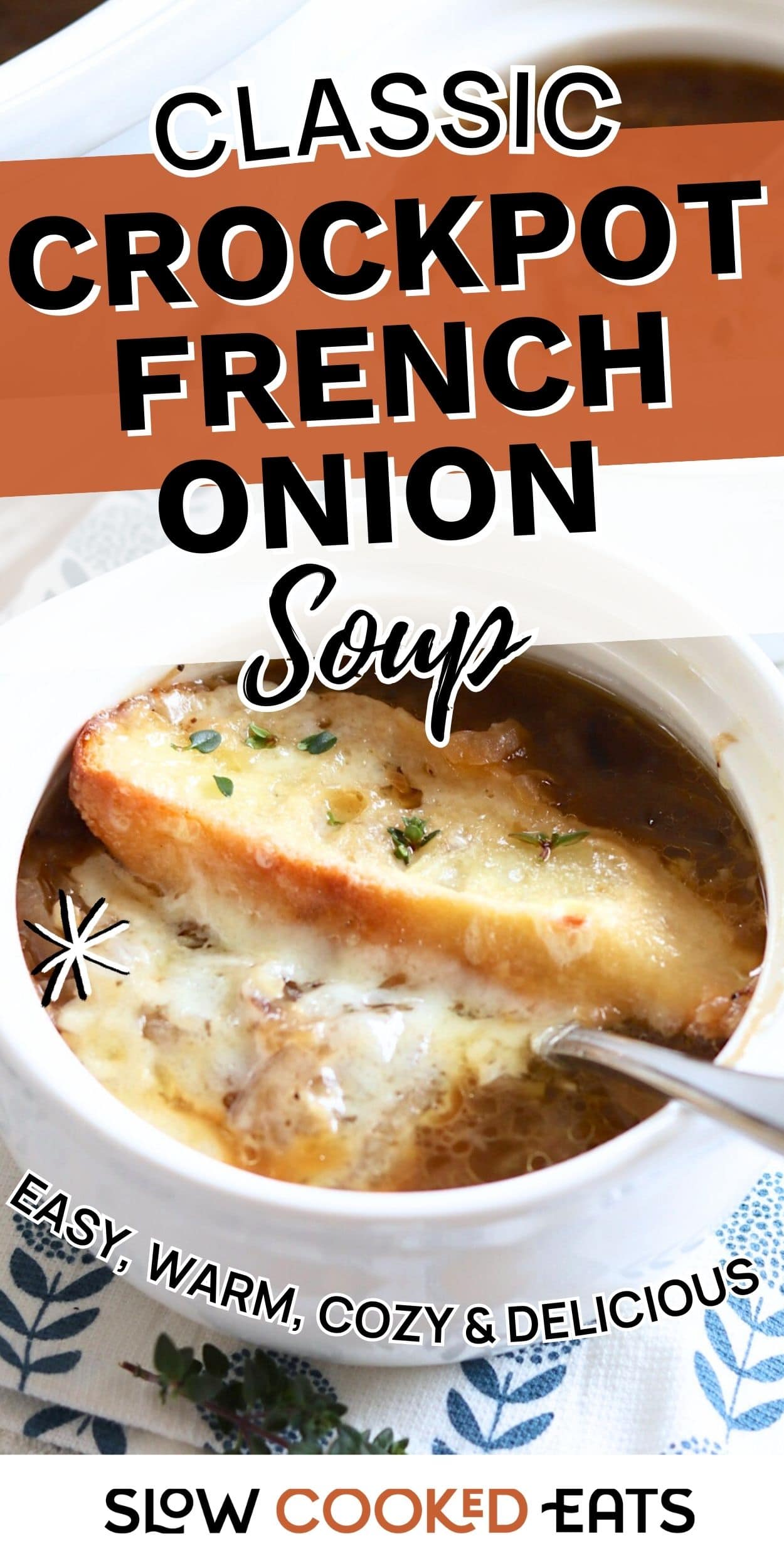 Bowl of crockpot French onion soup topped with melted cheese and toasted bread, shown in a white crock with a spoon for serving.