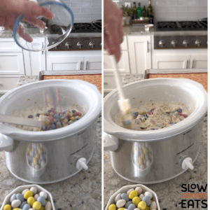 Adding in the candy to the slow cooker and mixing everything together to make crockpot Easter candy clusters.
