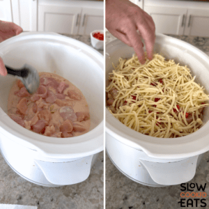 Adding the noodle and sauce mixture to the white oval slow cooker and adding the chicken on top. Finishing the top with shredded cheese for crockpot Cajun chicken alfredo.