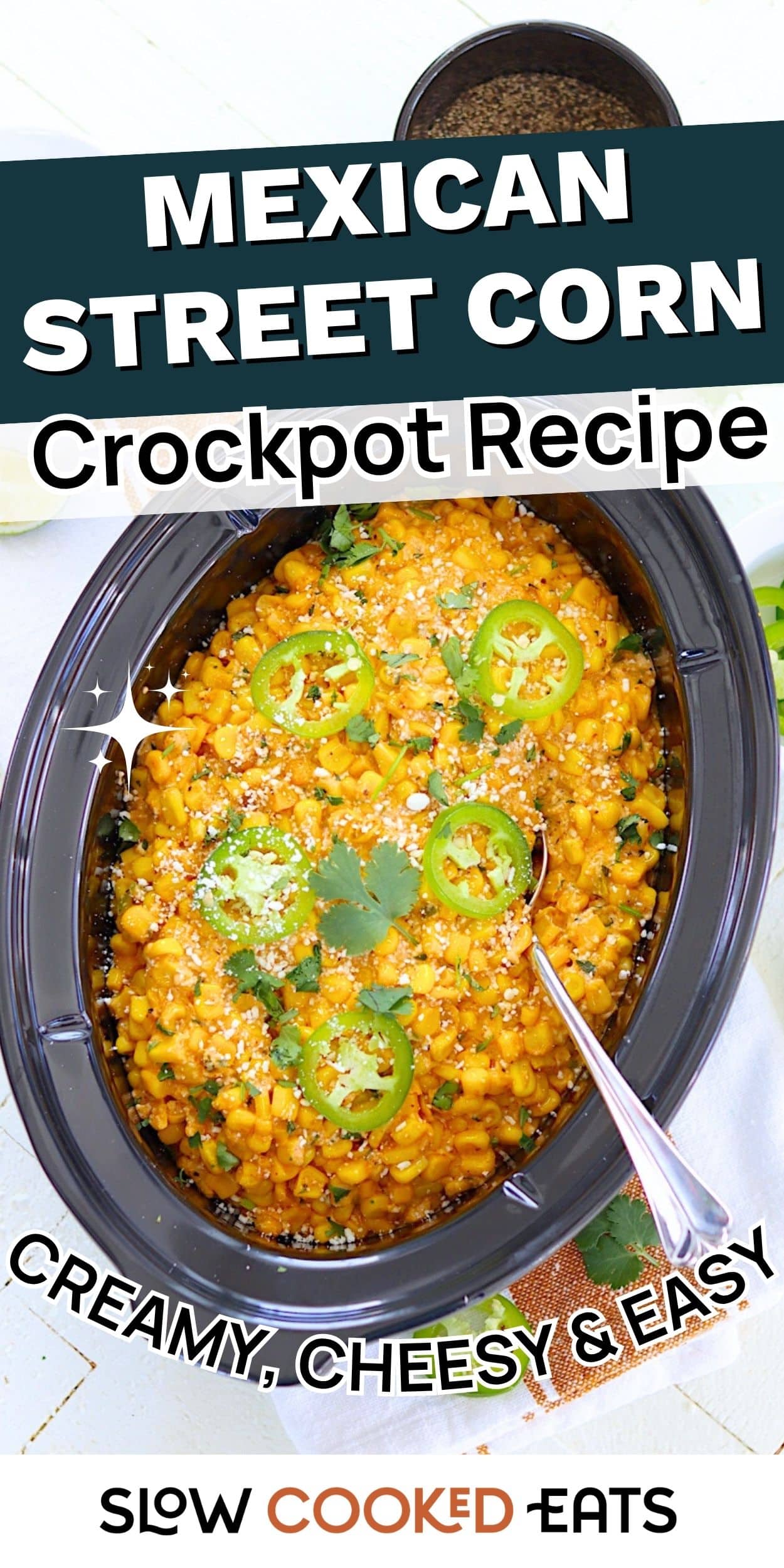 Crockpot filled with creamy Mexican street corn topped with jalapeños, cilantro, and cheese. Easy Mexican corn side dish recipe perfect for parties and summer meals.