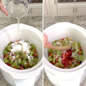 Adding all the ingredients to an oval white slow cooker to make crockpot strawberry rhubarb jam.