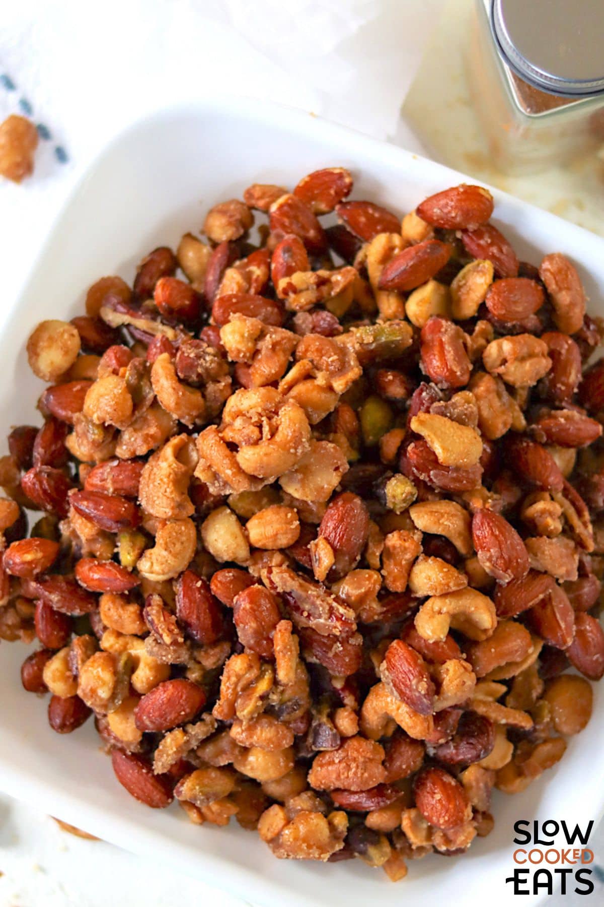A bowl of easy crock pot candied nuts.